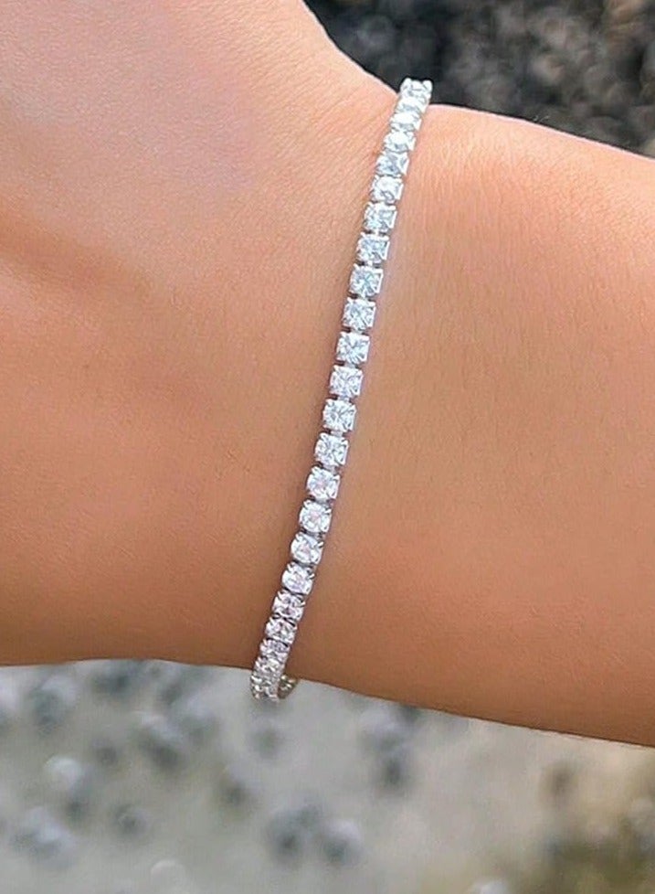 Luxuria A classic tennis bracelet plated in 18k white gold with a high-quality 6mm carbon diamond, suitable for everyone; a classic tennis bracelet set with cubic zirconia. - Image 1